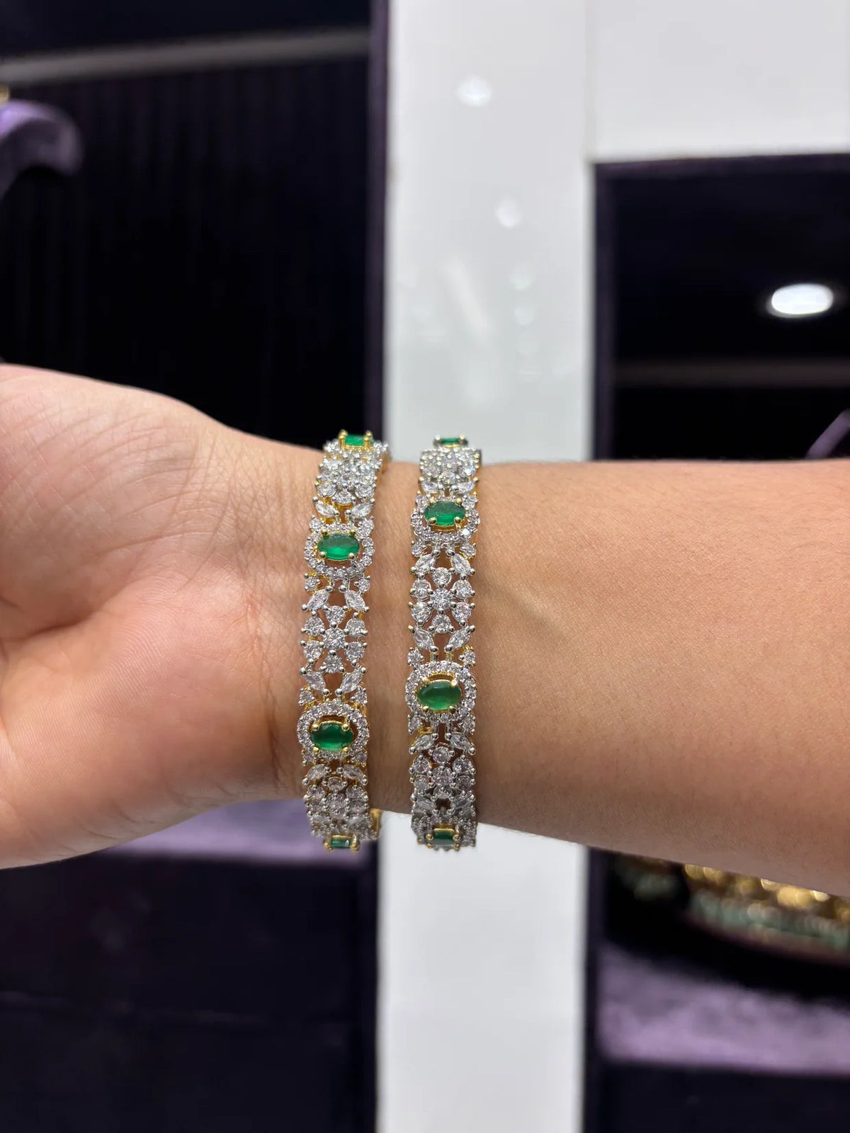 Elegant Emerald Diamond-Studded Bangles