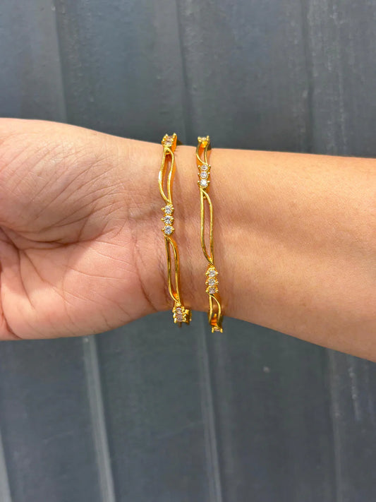 Wavy Gold Bangles with CZ Stones – Chic & Modern