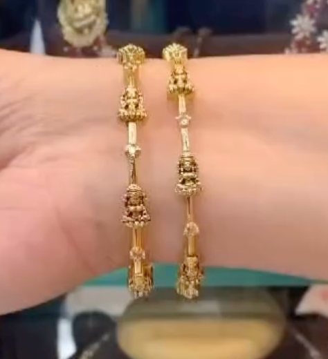 Elegant Gold-Tone Temple Bangles with Intricate Detailing