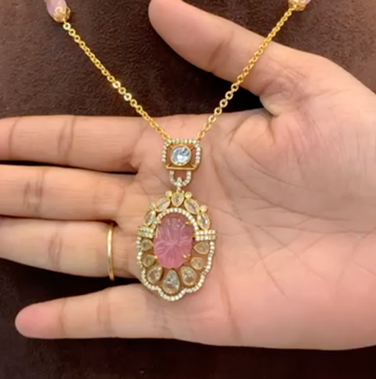 Elegant Pink Stone Pendant Necklace with Gold Detailing