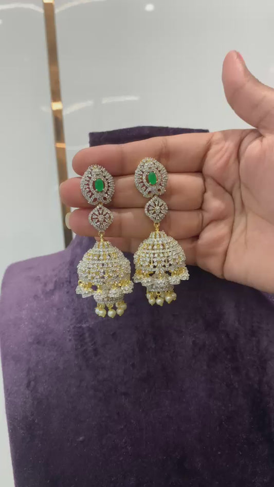 Diamond Finish Jhumka Earrings with Green Stone Center